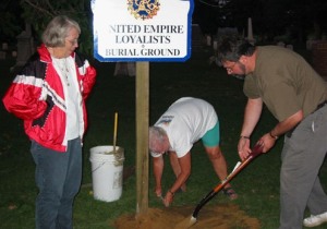 The marker being erected at Woodhouse United Cemetery