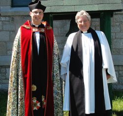The Reverend Father Bradley D. Smith, Chaplain of Christ Church, Her Majesty's Chapel Royal of the Mohawks, with the Rev. Joyce Blackburn