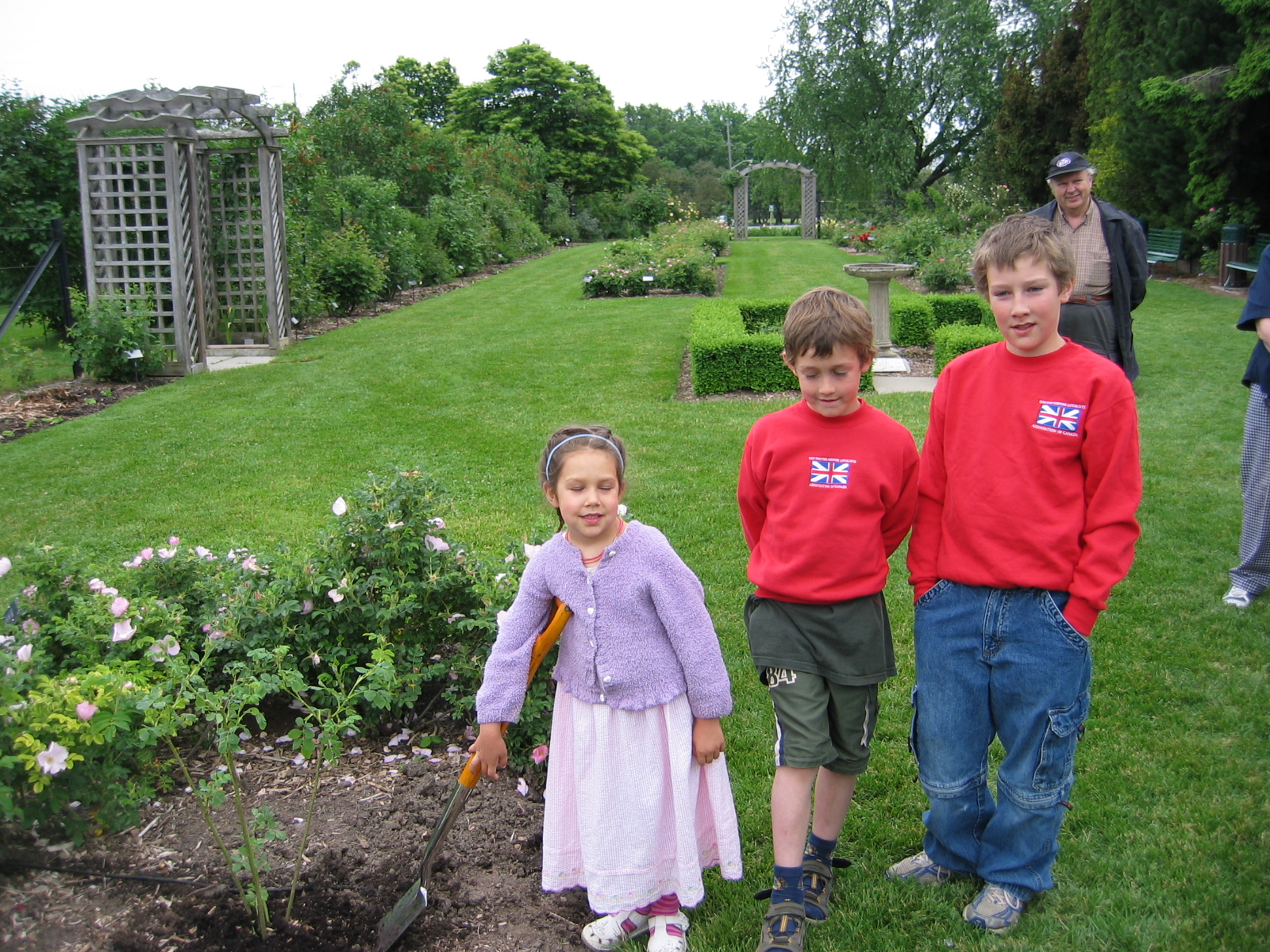 Hayward grandchildren planting the Loyalist Rose